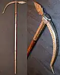 Indian war hammer, 19th century, hard wood shaft with full length metal strip for re-enforcement, silver koftgari decoration
