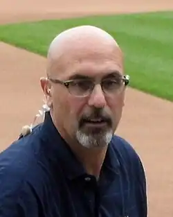 A man in a navy blue shirt