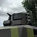 Close-up view of the commander's sight with MSSA system, RMG 7.62 machine gun and C-UAS radar