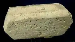 Image 7When minerals react, the products will sometimes assume the shape of the reagent; the product mineral is termed a pseudomorph of (or after) the reagent. Illustrated here is a pseudomorph of kaolinite after orthoclase. Here, the pseudomorph preserved the Carlsbad twinning common in orthoclase. (from Mineral)