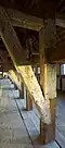 The bottom part of many of the heavy, load-bearing oak pillars were replaced with new timber in 2013.