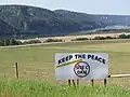 Signs protesting the Site C dam along Highway 29 between Fort St. John and Hudson's Hope, 2014