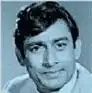 Khan Joynul poses with a finger pointed up