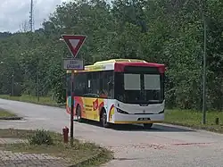 A bus decorated with the flag of Selangor