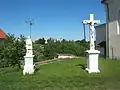 Statue of Saint Wendelin (1903) and stonecross (1867)