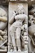 Surasundari applying eye makeup