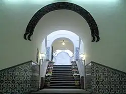 Inside the main entrance, the title granted to Macau by King João IV is displayed.