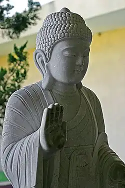 Image 26A stone image of the Buddha (from Culture of Asia)