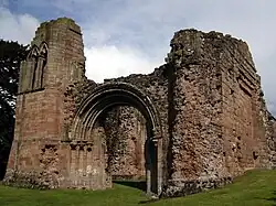 Western end of remains of the church, showing the main west portal and the still-massive northern support for the tower.