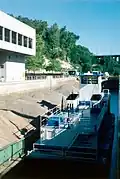 Towboat Patrick Gannaway taking a load of sand and gravel through Lock Number 1.