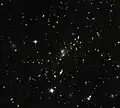 Magnifying the distant universe through MACS J0454.1-0300.[32]