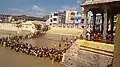 Devotees taking bath Portamarai Tank