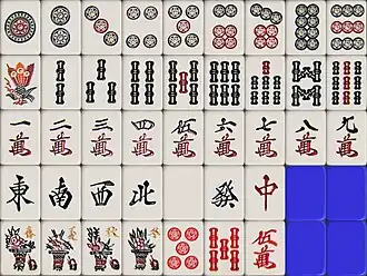 Another Japan style with a different peacock pattern on the one bamboo. 4 season tiles and red five tiles are present.