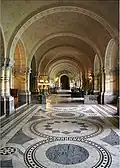 Main hall of the Peace Palace. The background is the entrance of the Courtroom of the International Court of Justice.