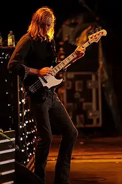 Stoermer performing with the Killers in 2011