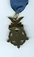 View of back of Medal of Honor presented to Marcus W. Robertson with inscription