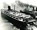 City of Midland 41 docked at Manitowoc, Wisconsin c. 1950s. Notice City of Midland 41's large automobile capacity.