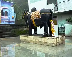 Nandi - Shiva's bull in front of Hindu temple, Rewalsar, HP, India