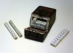 Image 29An ivory set of Napier's Bones, an early calculating device invented by John Napier (from Scientific Revolution)