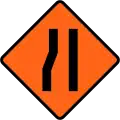 Road narrows on left