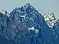 Merchant Peak centered, with the southeast subsidiary subpeak (5,831 ft) to the right. The subpeak is mistakenly labelled as Merchant Peak on old USGS maps.