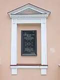 Plaque commemorating the victims of the Massacre of Praga