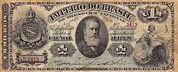 Photograph of a banknote containing a picture of a bearded man on the right side and a large printed number 1 on the left side