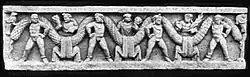Yakshas holding Garlands, Peshawar Museum.