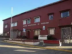 A red two-story building
