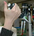 User ready to dispense liquid present in pipette tip