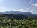 Plesa peak 1,470 metres (4,820 ft) seen from Cornetul mountain.