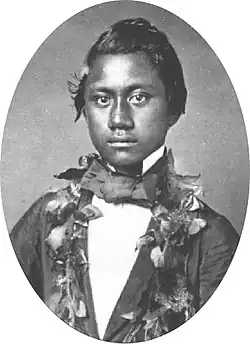 Prince Alexander Liholiho wearing a lei garland