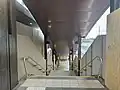 Stairs leading to Platform 2 from the eastern entrance, October 2024