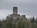 great hall, residential buildings and outbuildings to the east below the keep
