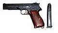 Experimental 44/16 with a double column 16-Round Magazine