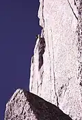The Great White Headwall above the sandy ledges, the crux of the route.