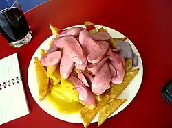 The salchipapas' high energy content is a concern for advocates of public health.