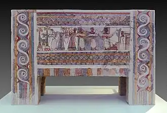 The Hagia Triada sarcophagus; 1370-1315 BC; limestone; length: 1.4 m, height: 0.9 m; from Chamber Tomb 4 at Hagia Triada, near Phaistos (Crete); Heraklion Archaeological Museum[13]