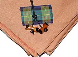 Image 13Wood Badge beads and neckerchief. Wood Badge is the premier Boy Scout adult leader training course. A holder of the Wood Badge is a leader highly trained and dedicated Scout leader.