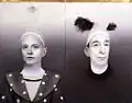 Portrait (with feathers), portrait of the artist (on the left) with her husband, Leonard Post, on the right. 2007.