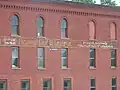 Signage detail on the northern elevation of the Brand Building