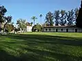 Look at the adobe and French Basque home, facing southeast.