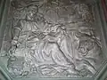 Relief of St Luke on the pulpit.