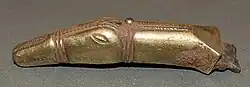 Colour photograph of the horse-head terminal from the Staffordshire helmet