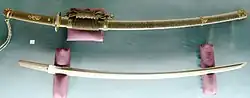 Tachi forged by Bizen Osafune Sukesada, 1515. Scabbard in aogai-nashiji lacquer, gold decorations. Tokyo National Museum.