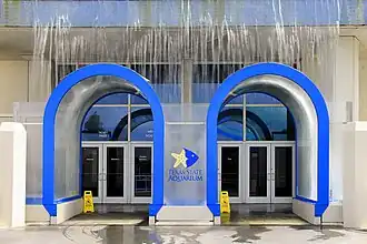 Waterfall over the entrance doors.
