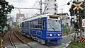 Blue-liveried 7704 in August 2016