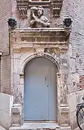 Door of the stair tower of the Hôtel de Brucelles (1544).