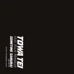 The single's title and performers are written vertically. The rest of the cover is pitch black.