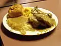 Image 26 Smothered chicken, mashed potatoes and gravy, macaroni and cheese and roll (from Culture of Arkansas)